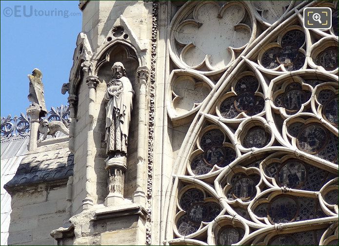 Statues next to south Rose window